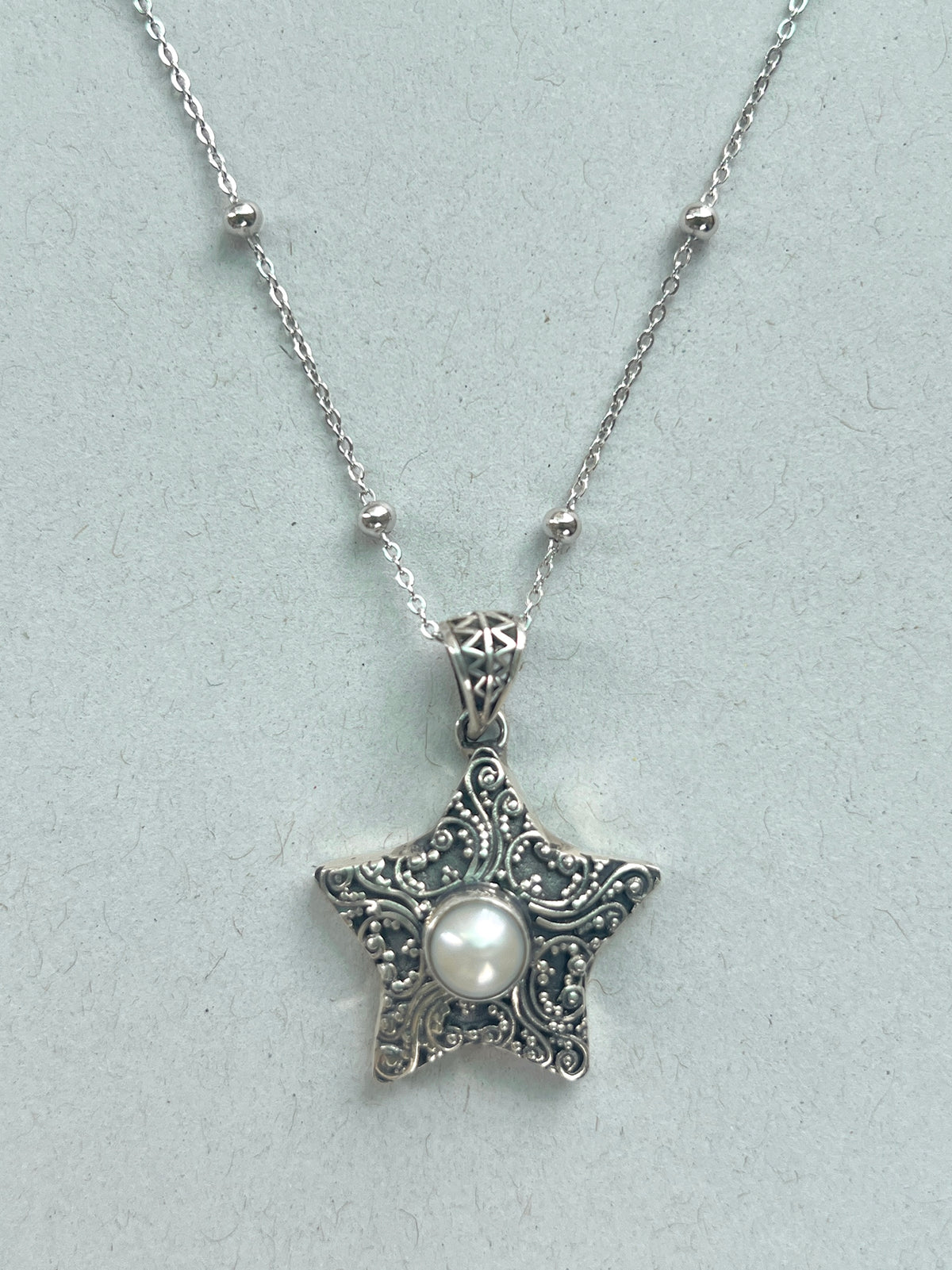 Ornate Pearl Star Necklace