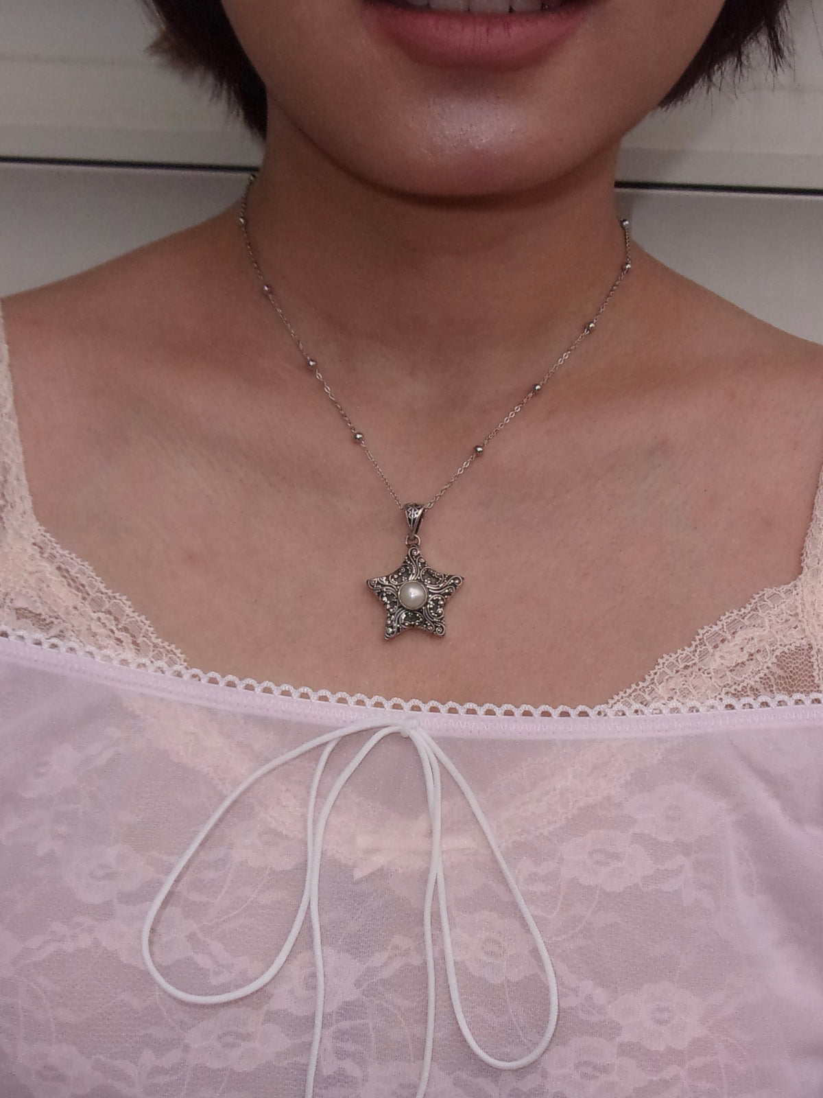 Ornate Pearl Star Necklace