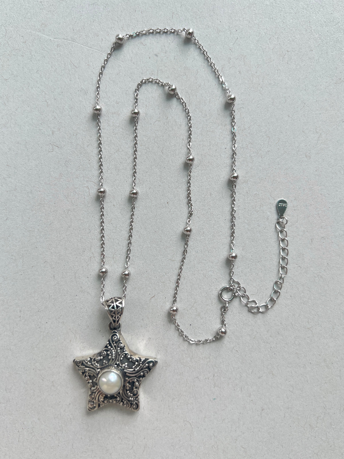 Ornate Pearl Star Necklace